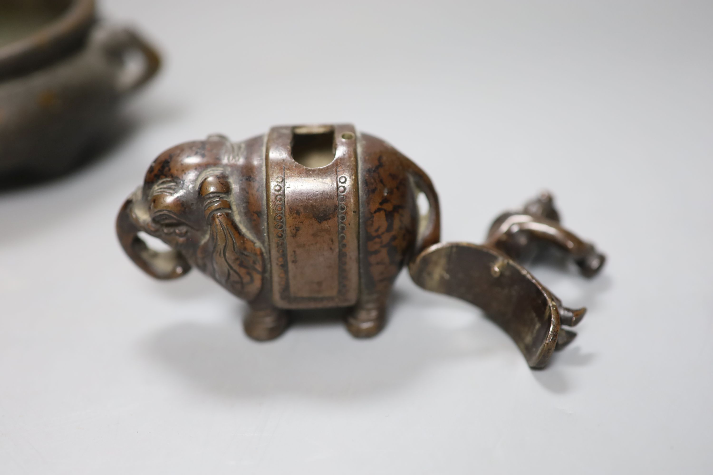 A Chinese late Ming bronze miniature vase, a modern censer and a Japanese elephant censer with boy cover, c.1900, tallest 10cm